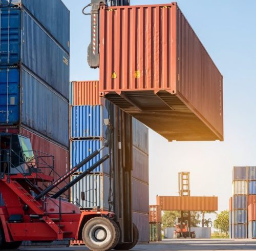 forklift-working-in-the-container-cargo-yard-port-loading-cargo-tank-logistic-service-and-transport-e1665466492906.jpg
